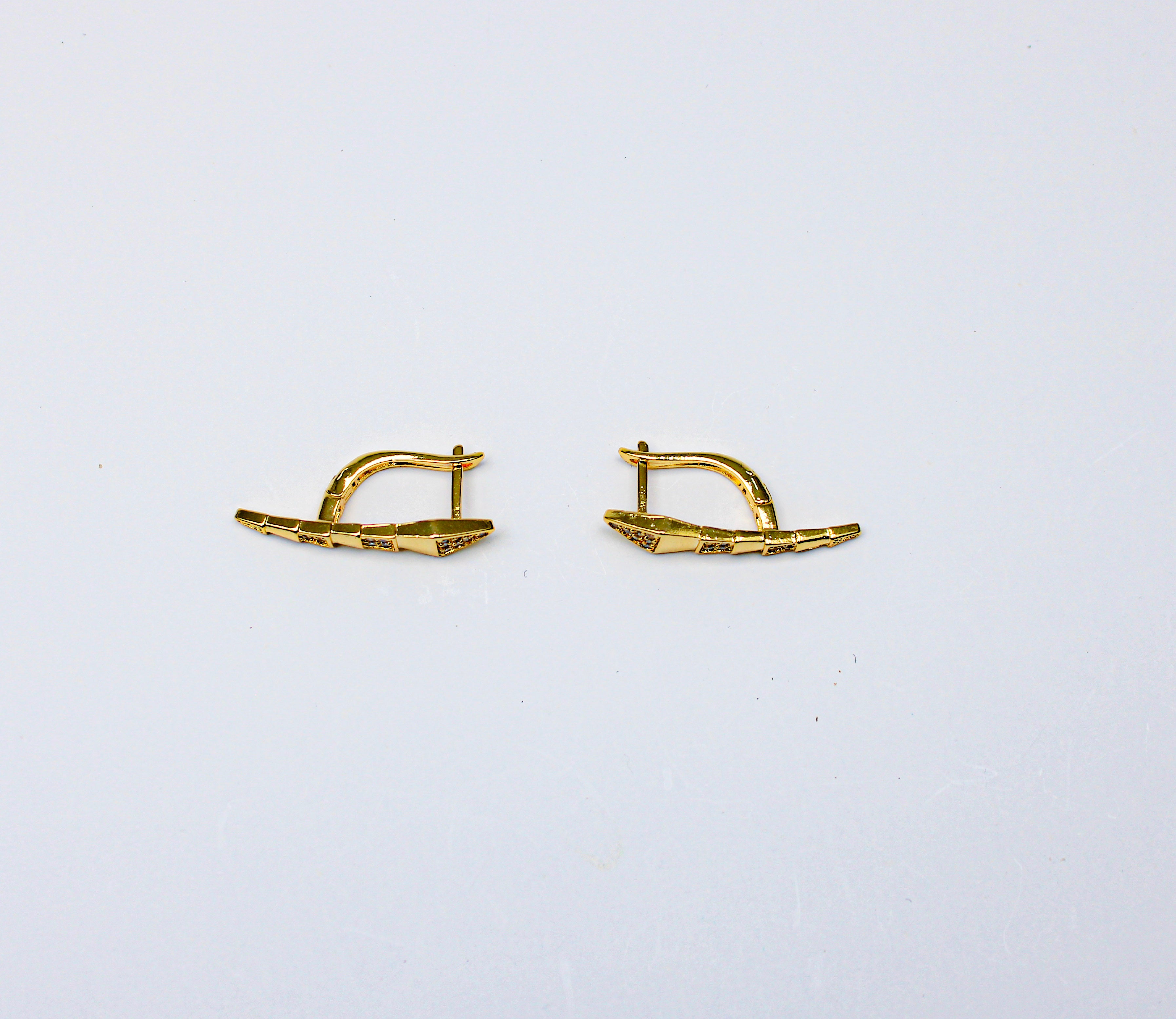 losh jewellery  snake oorbellen goudkleurig