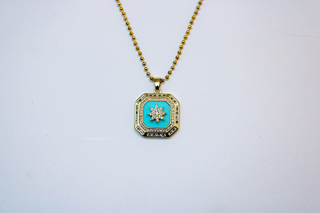 losh jewellery goud kleurig ketting met turquoise kleur hanger