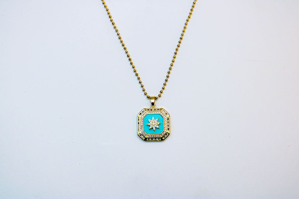 losh jewellery goud kleurig ketting met turquoise kleur hanger