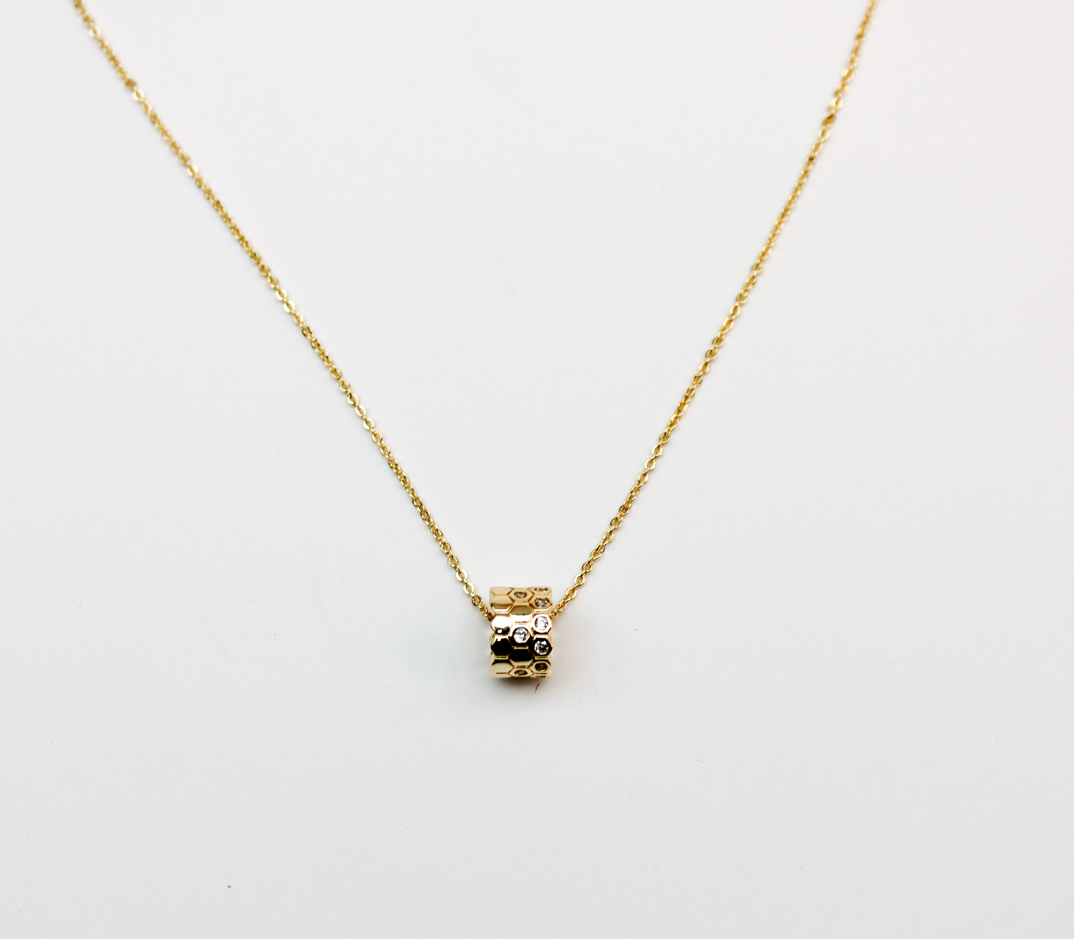 losh jewellery goud kleurig ketting met ring honinggraat hanger