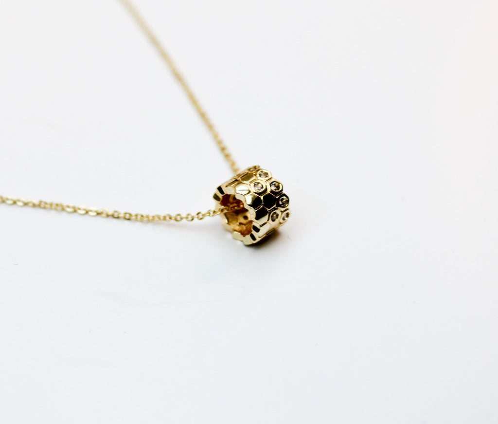 losh jewellery goud kleurig ketting met ring honinggraat hanger