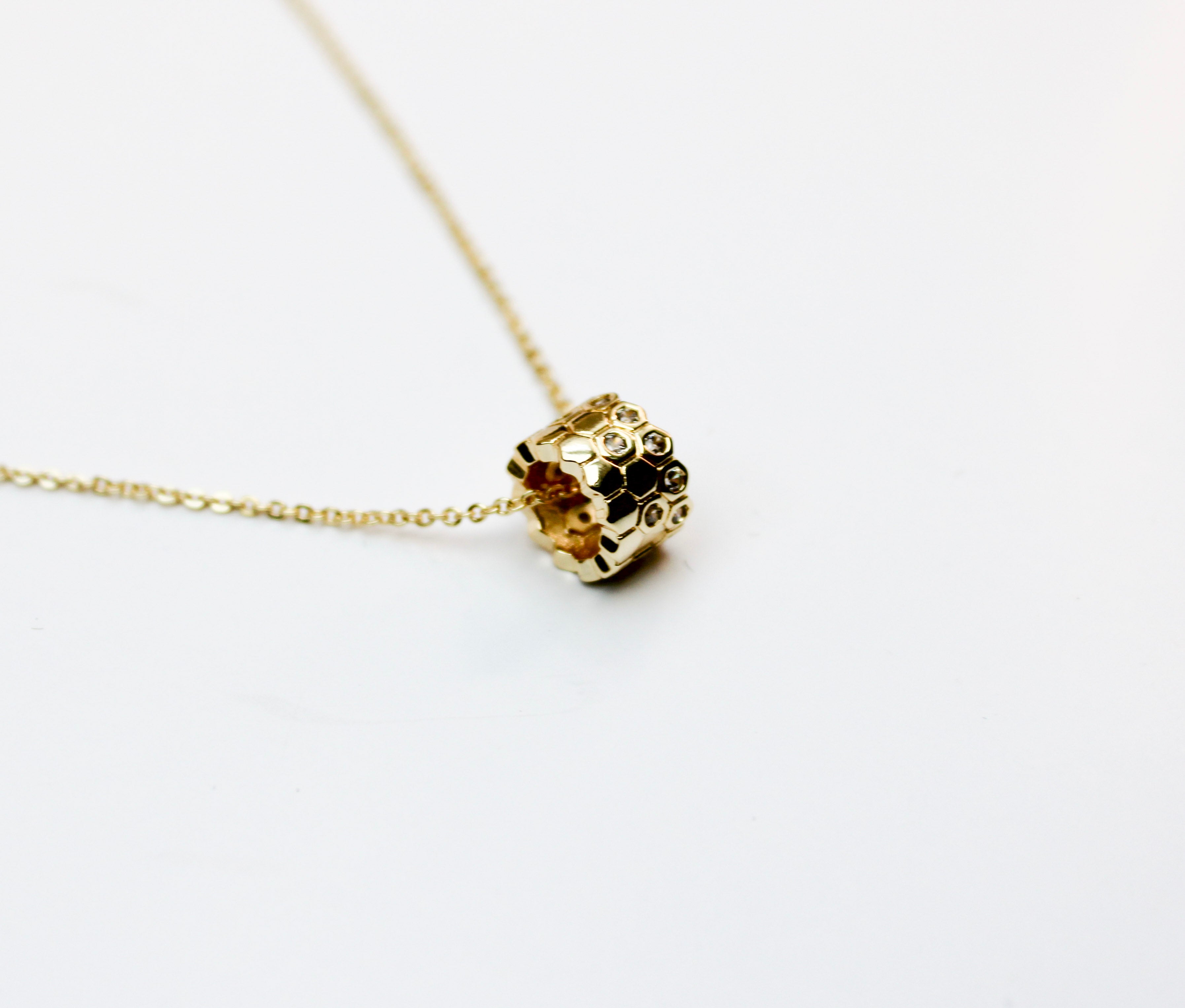 losh jewellery goud kleurig ketting met ring honinggraat hanger