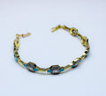 losh jewellery goudkleurig armband met Turquoise